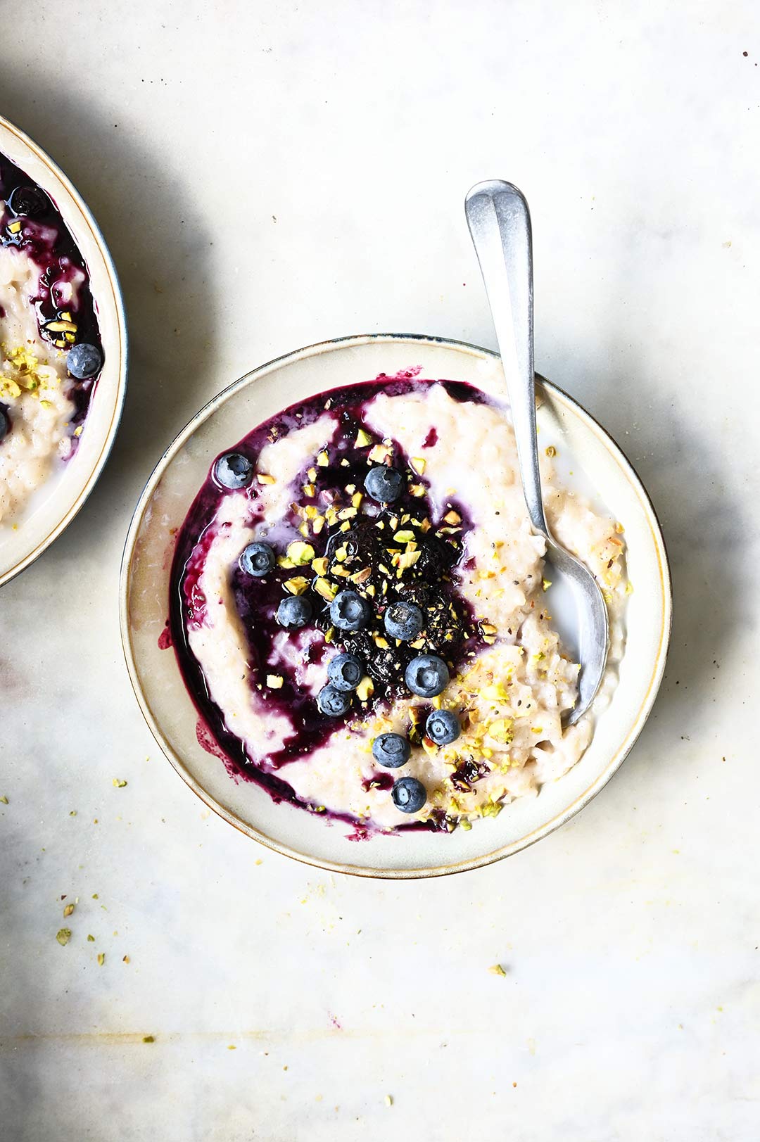 serving dumplings | Spiced coconut rice pudding with ginger blueberries
