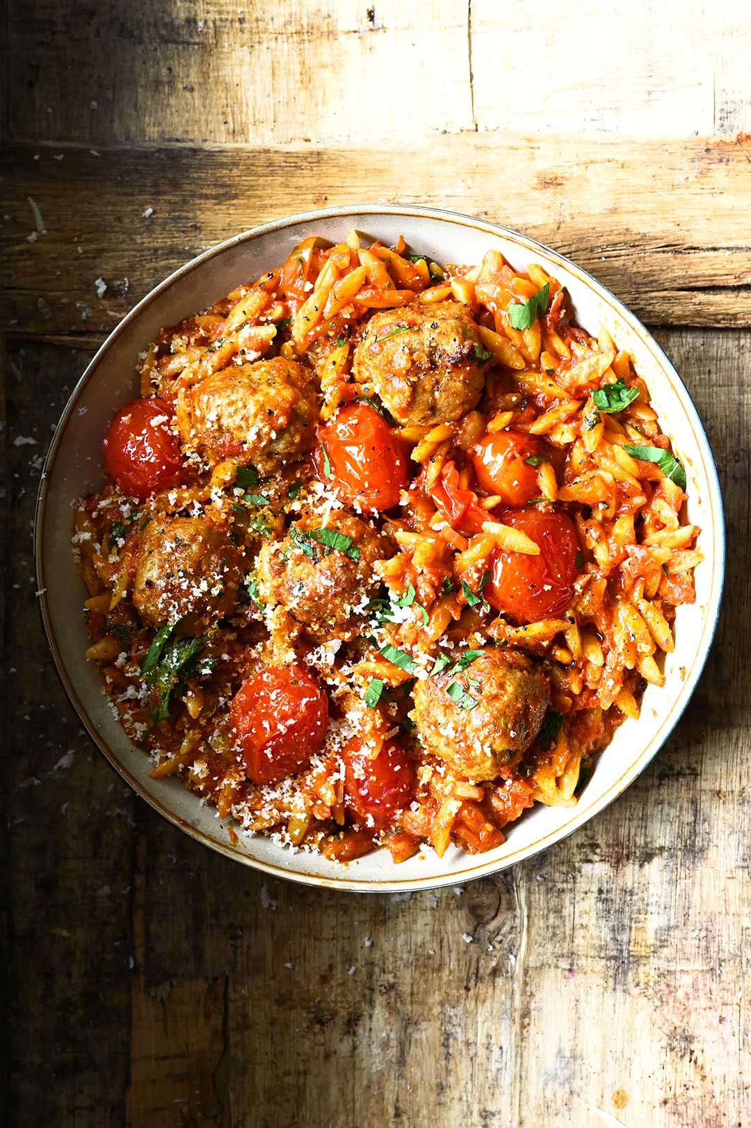 serving dumplings | Meatballs in tomato sauce with orzo