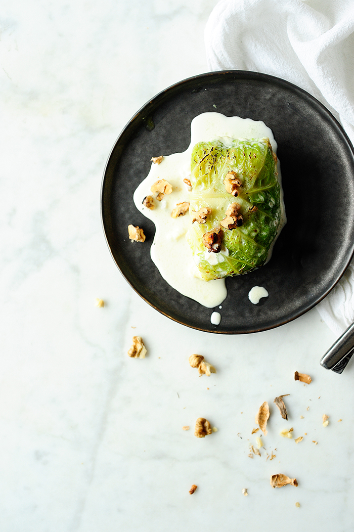serving dumplings | Potato, chicory and pear stuffed cabbage with gorgonzola sauce