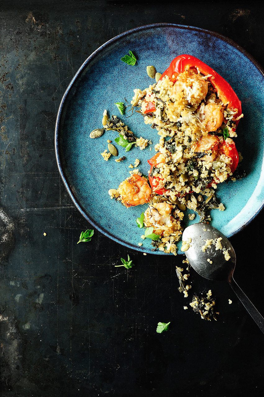 Quinoa stuffed peppers with kale and shrimps