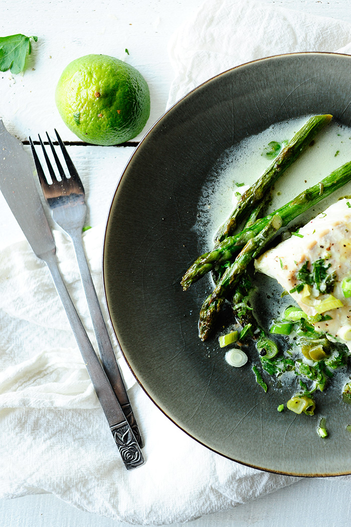 Cod in coconut sauce with asparagus and wasabi