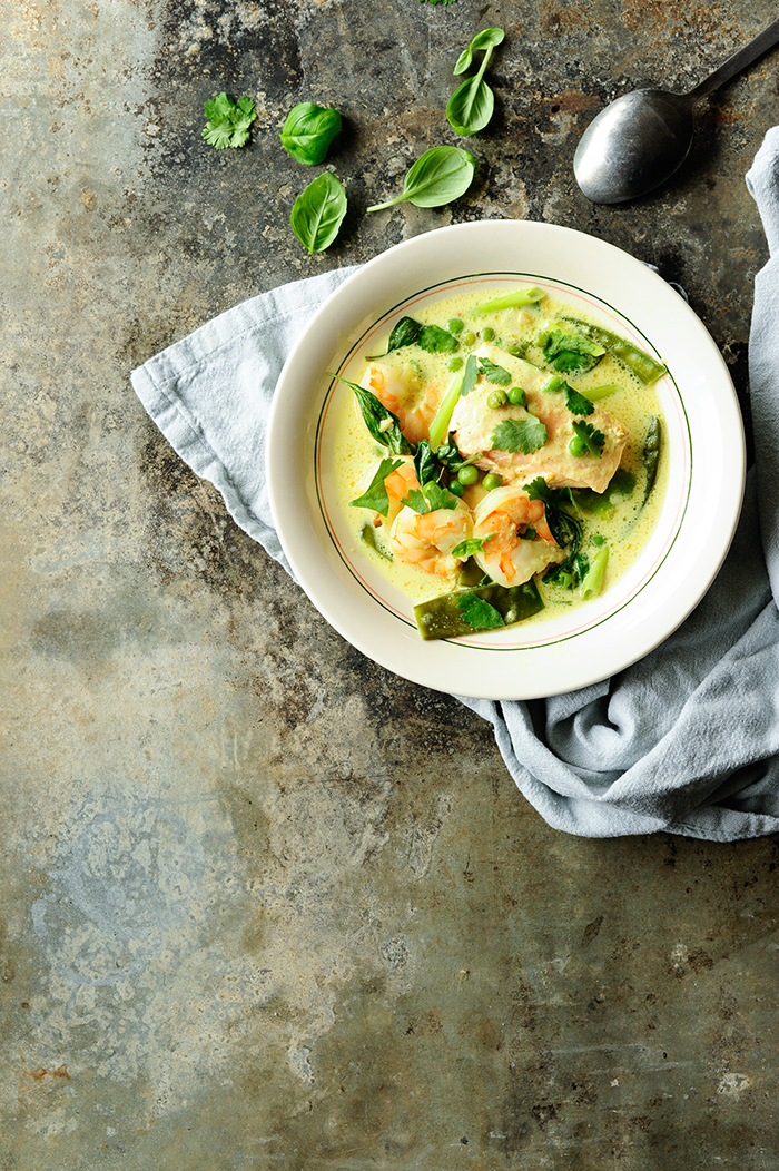 Coconut shrimp soup with salmon