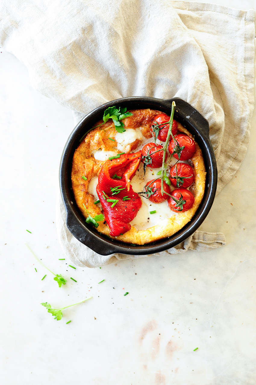 Savory Dutch baby with roasted peppers and tomatoes