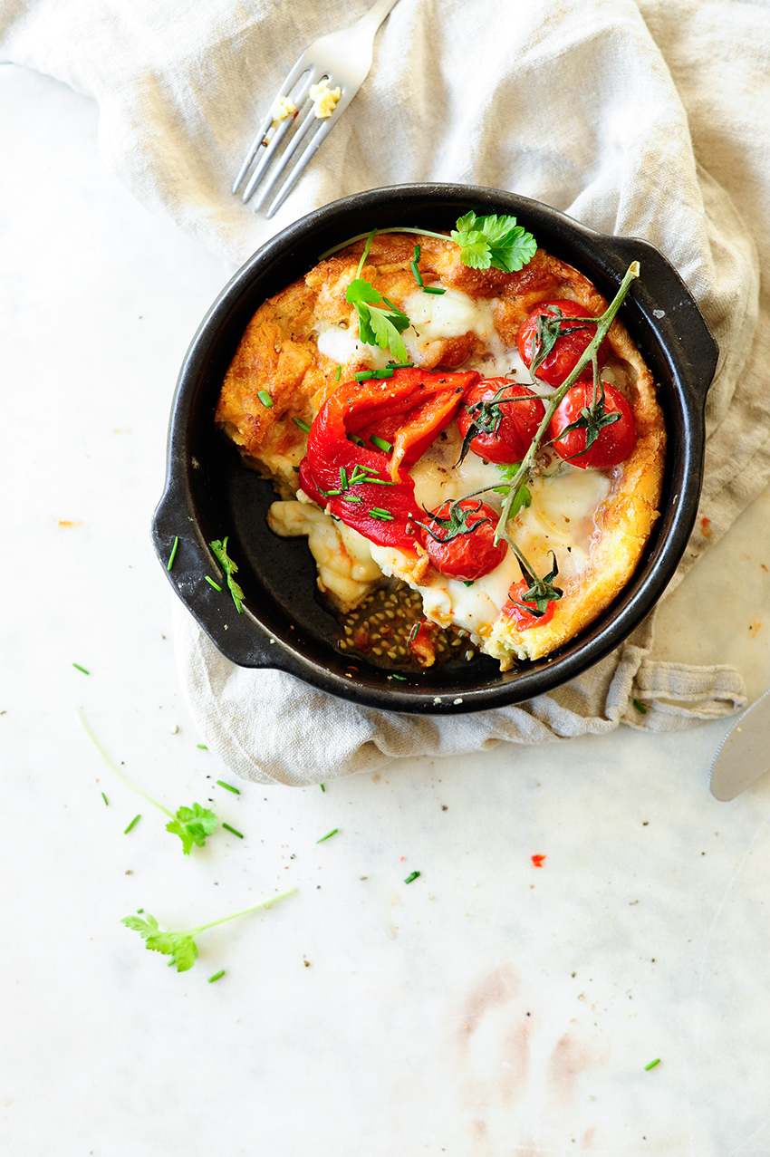 Savory Dutch baby with roasted peppers and tomatoes