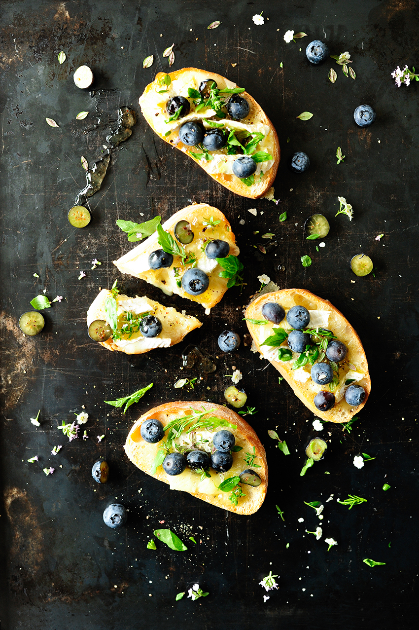 Blueberry brie crostini with elderflower dressing