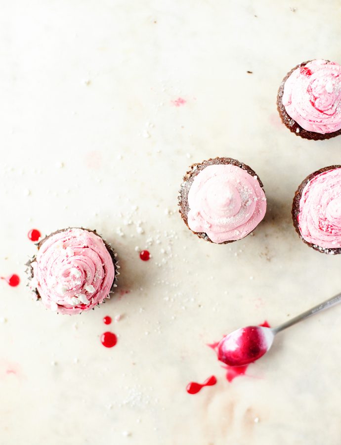 Chocolate cupcakes with cranberry buttercream