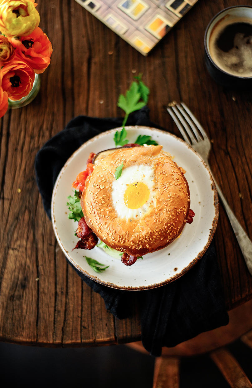 serving dumplings | Bagel egg in a hole with hummus and roasted veggies