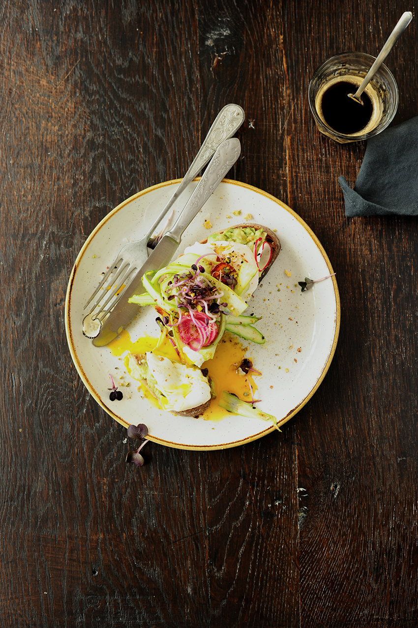 Shaved asparagus avocado toast with poached eggs and dukkah