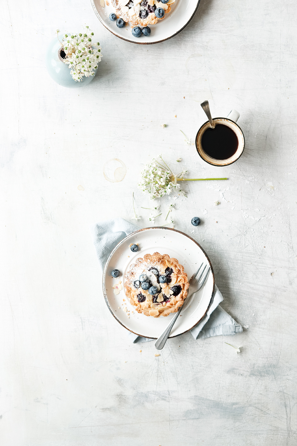 Almond tarts with blueberries