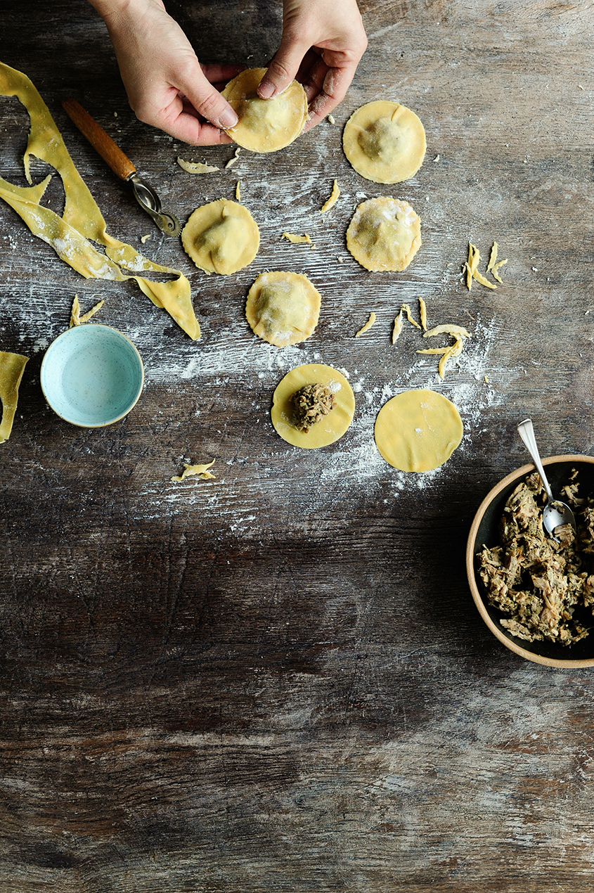 serving dumplings | Pulled chicken ravioli with sautéed chanterelles