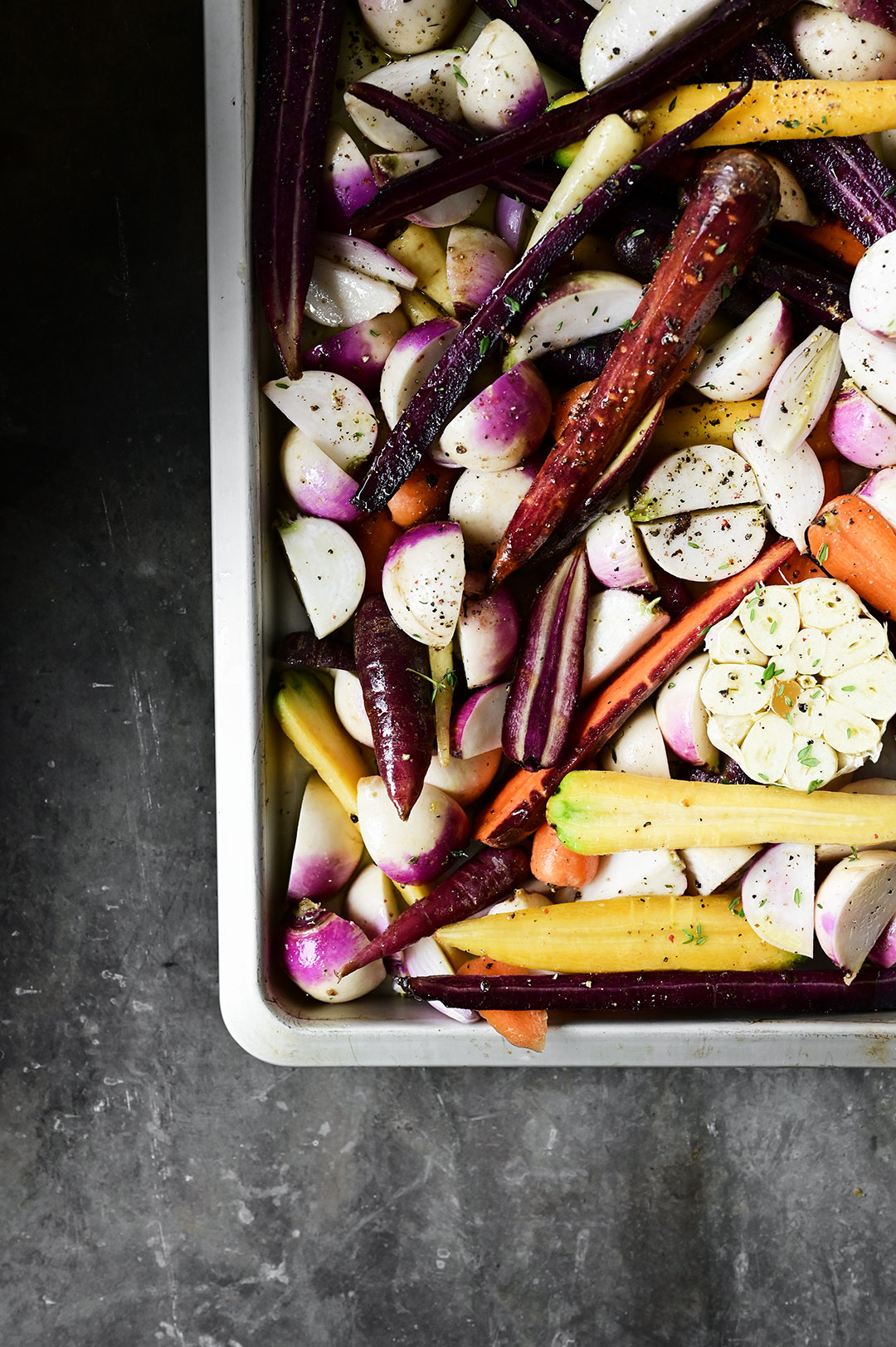 Garlic and maple syrup roasted veggies with hummus and turmeric tahini sauce