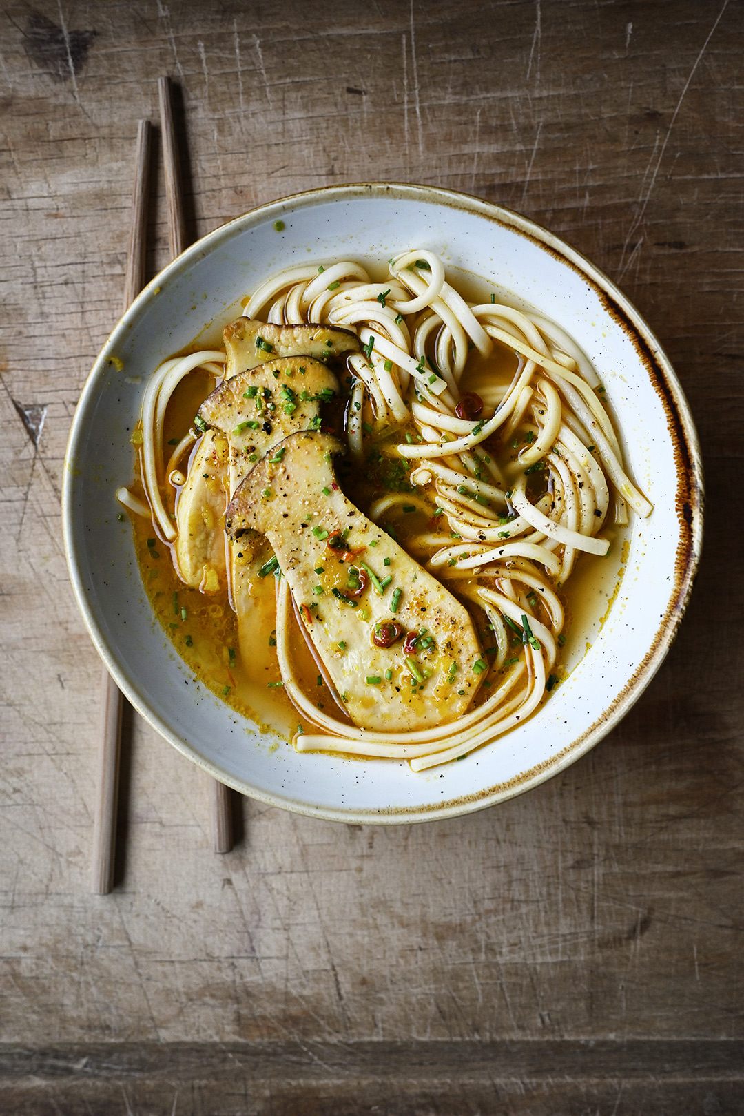 serving dumplings | Asian mushroom noodle soup