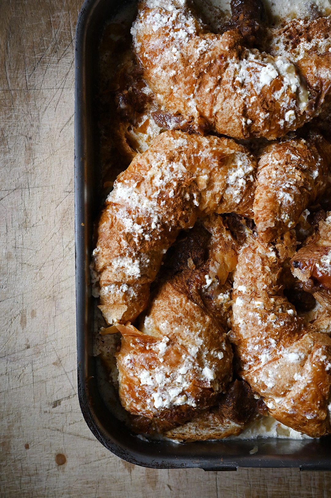 serving dumplings | Overnight pear and ricotta croissant French toast with almonds