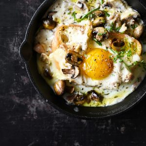 Creamy mushrooms with egg and shredded chicken on toast