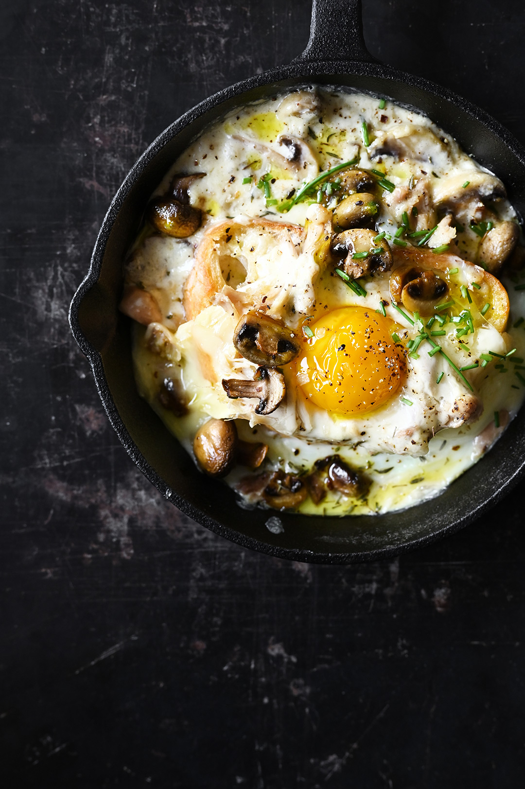 Creamy mushrooms with egg and shredded chicken on toast