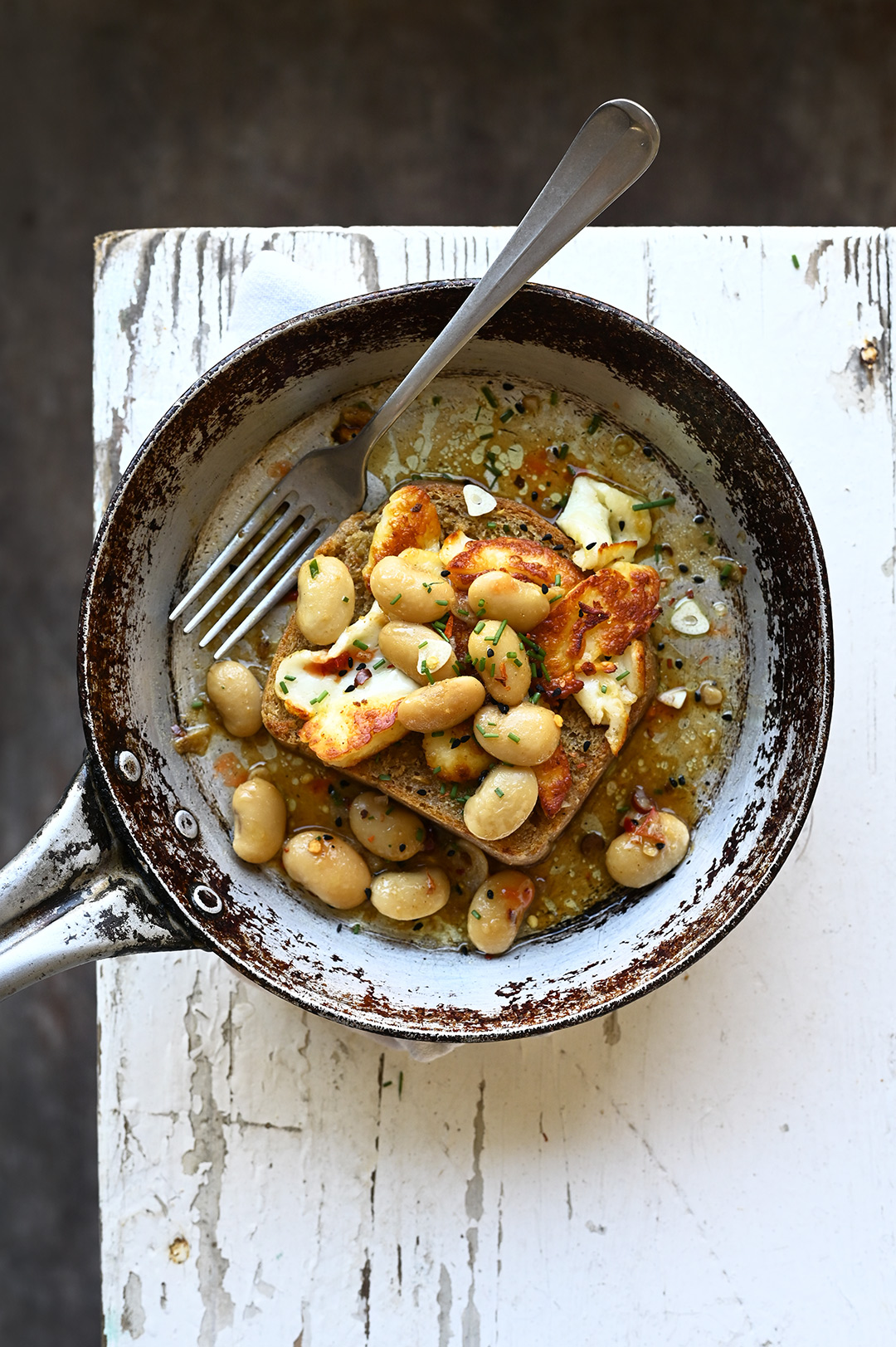 Spicy miso white beans with halloumi and toast