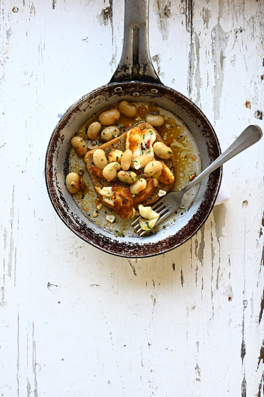 Spicy miso white beans with halloumi and toast