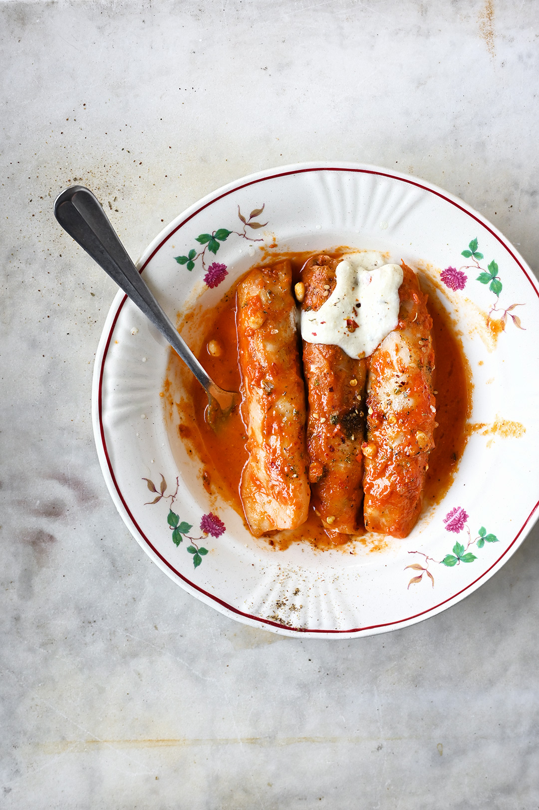 Lebanese cabbage rolls with lamb, feta and a garlic tahini sauce