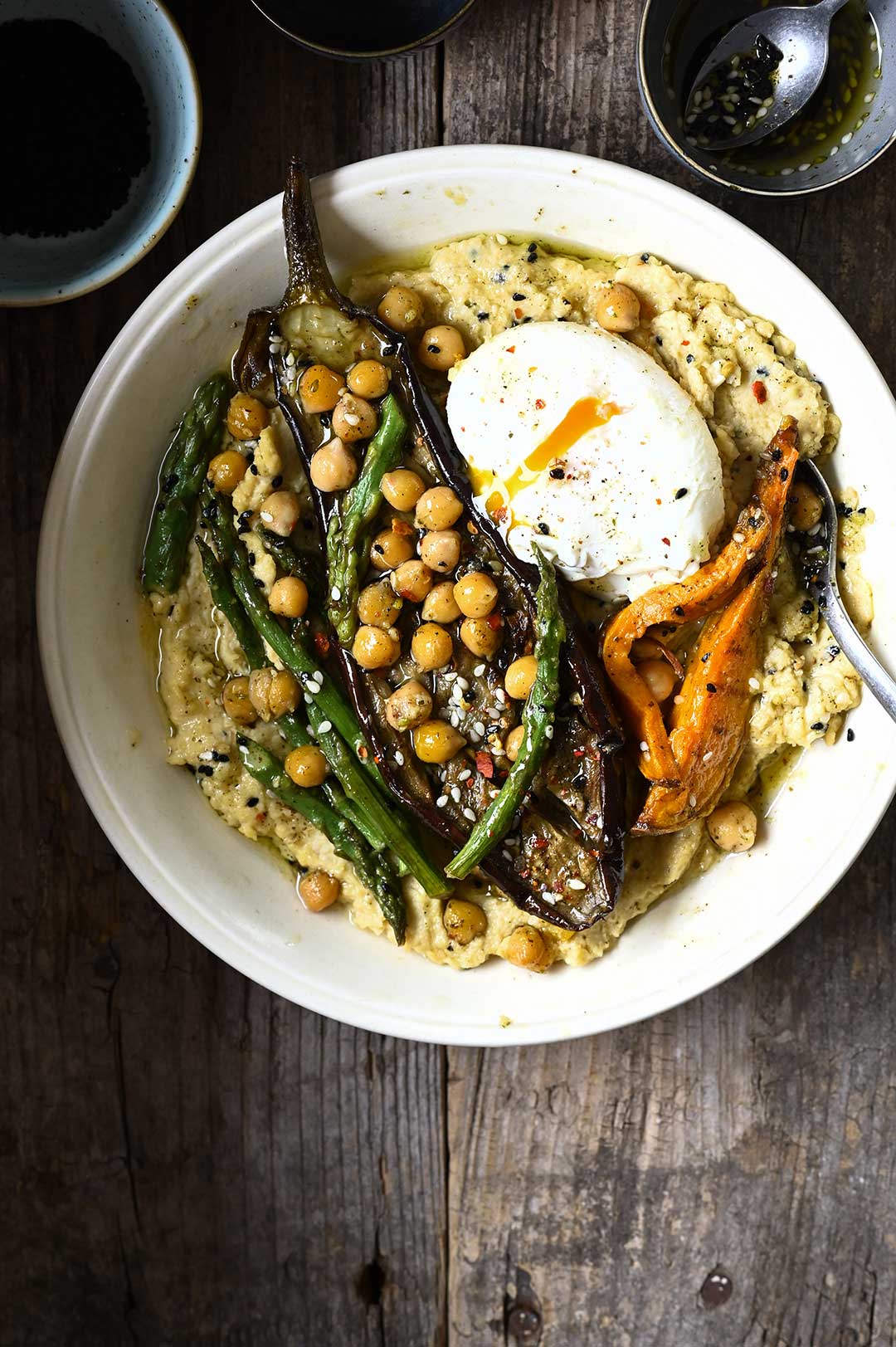 serving dumplings | Hummus bowl with roasted vegetables & za'atar oil 