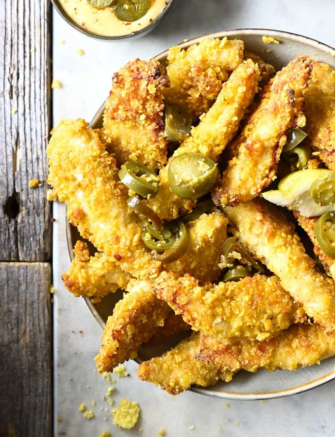 Corn chips crusted chicken fingers with jalapeño aïoli