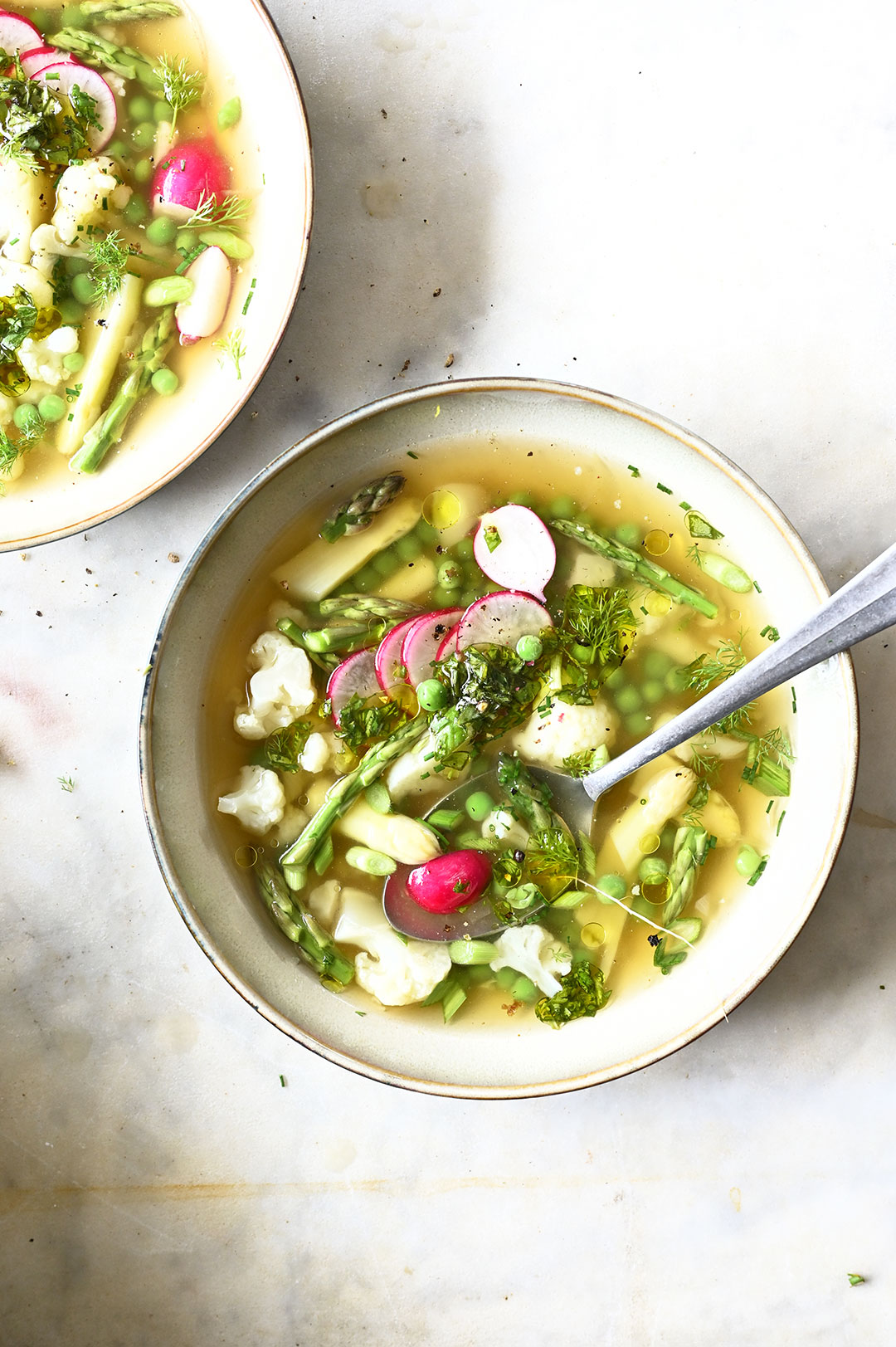 serving dumplings | Spring vegetable soup with basil pistou