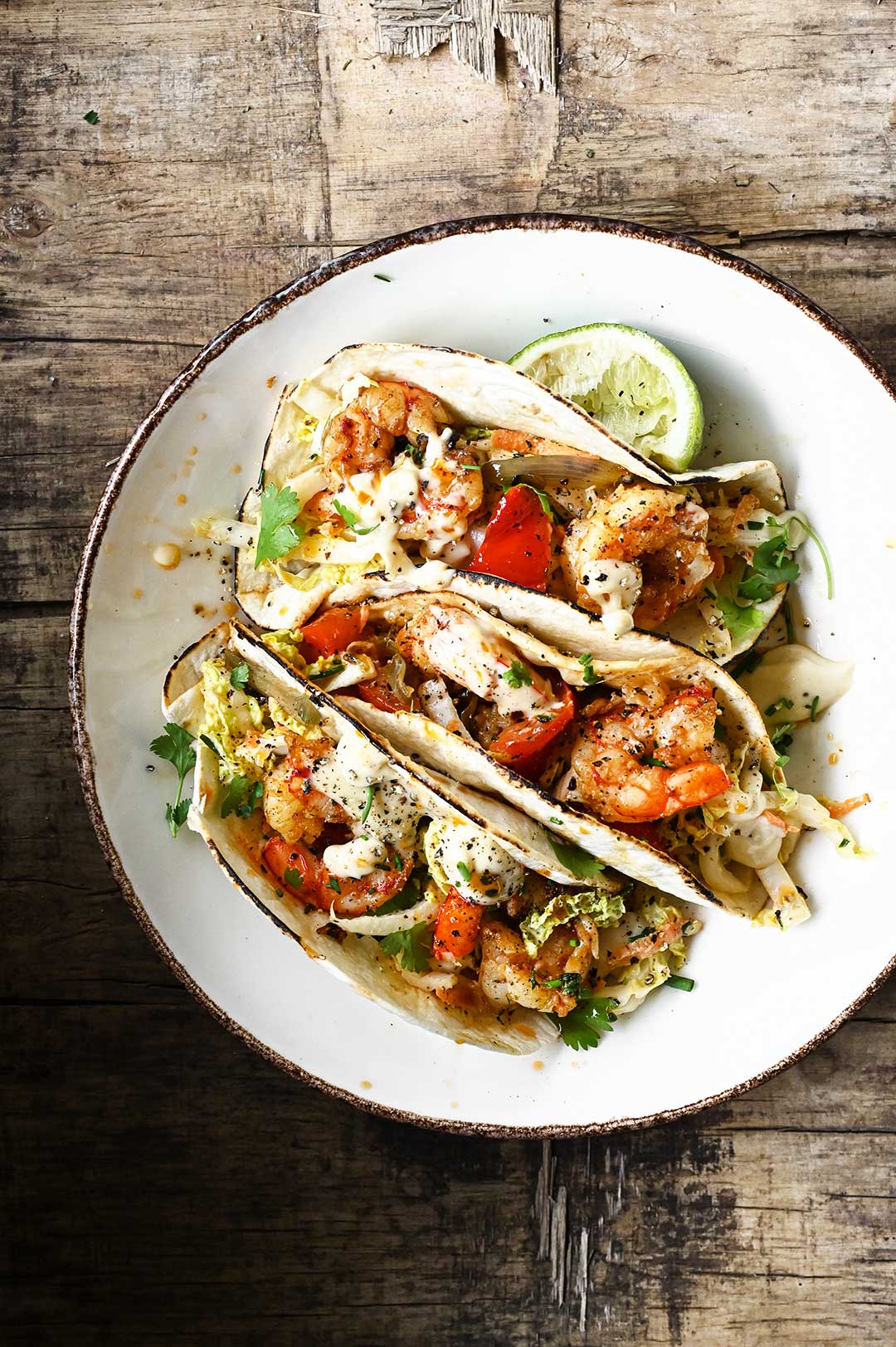 Spicy shrimp tacos with miso aioli slaw