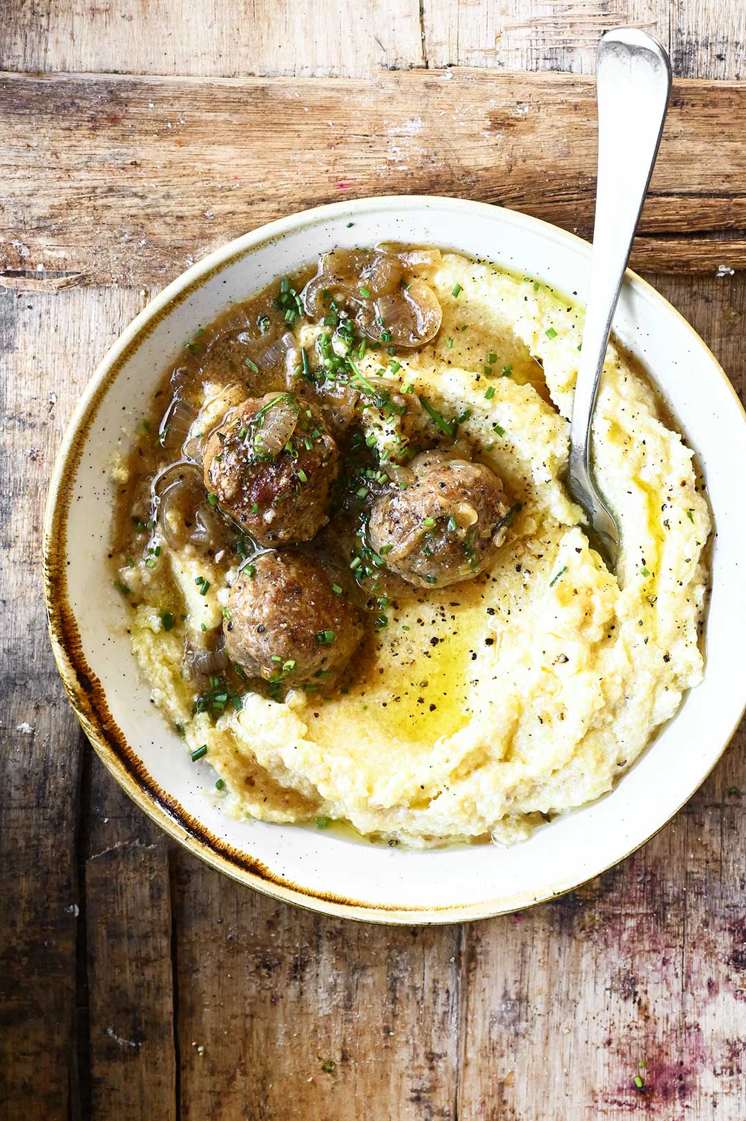 serving dumpings | Ricotta Polenta with Drunken Meatballs 