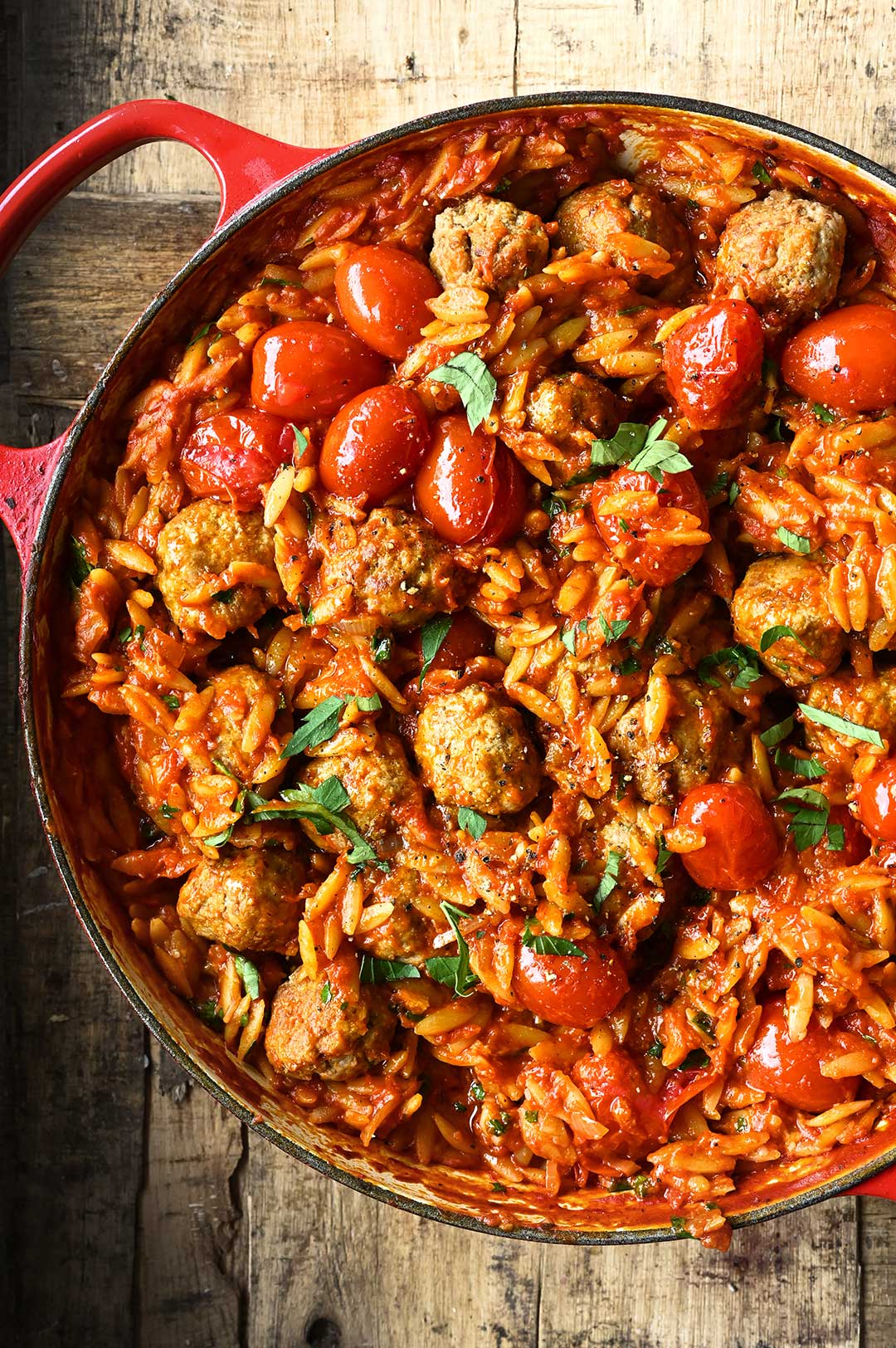 Meatballs in tomato sauce with orzo