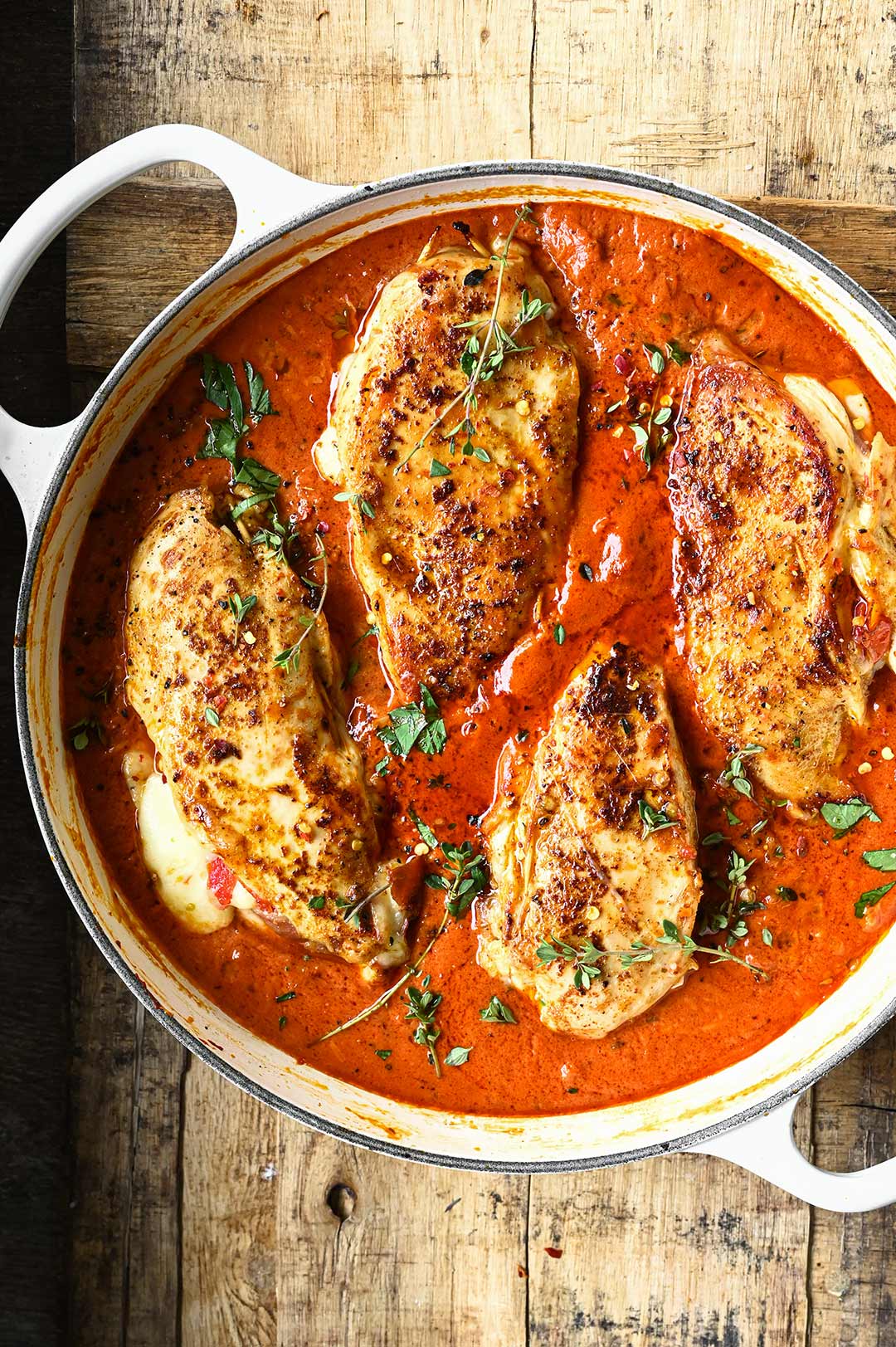 mozzarella stuffed chicken in creamy tomato sauce