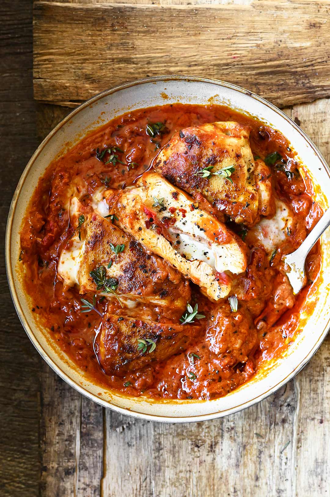 mozzarella stuffed chicken in creamy tomato sauce