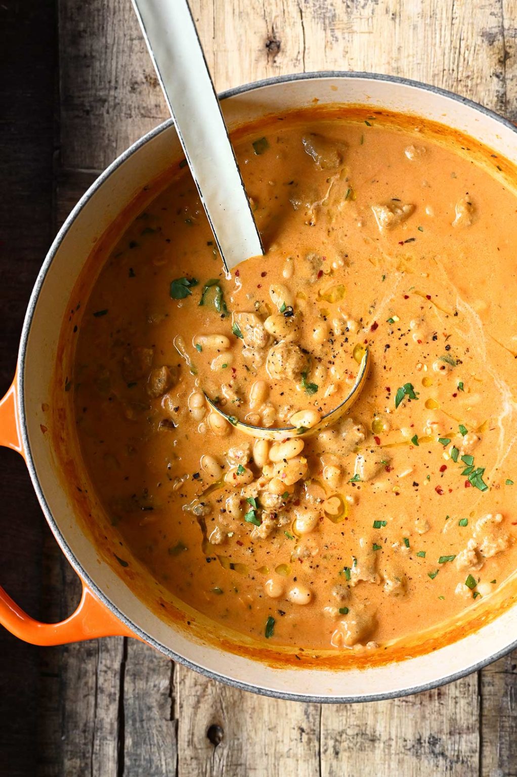 Creamy Bean Soup with Sausage Serving Dumplings
