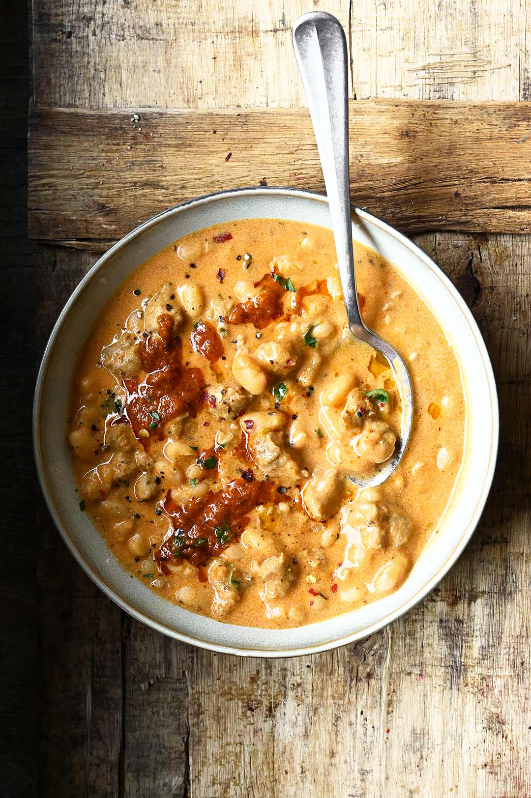 Creamy Bean Soup with Sausage - Serving Dumplings