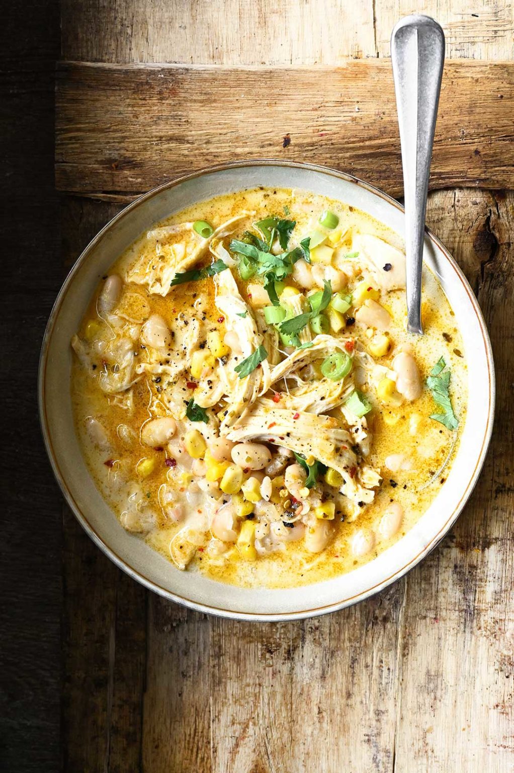 White Chicken Chili with Cream Cheese Serving Dumplings