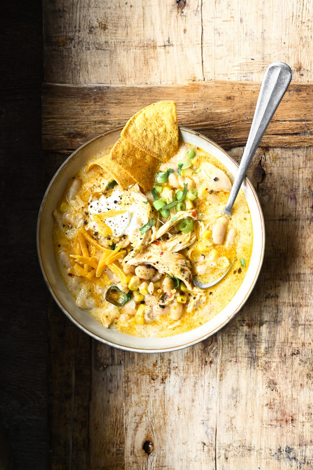 White Chicken Chili with Cream Cheese Serving Dumplings
