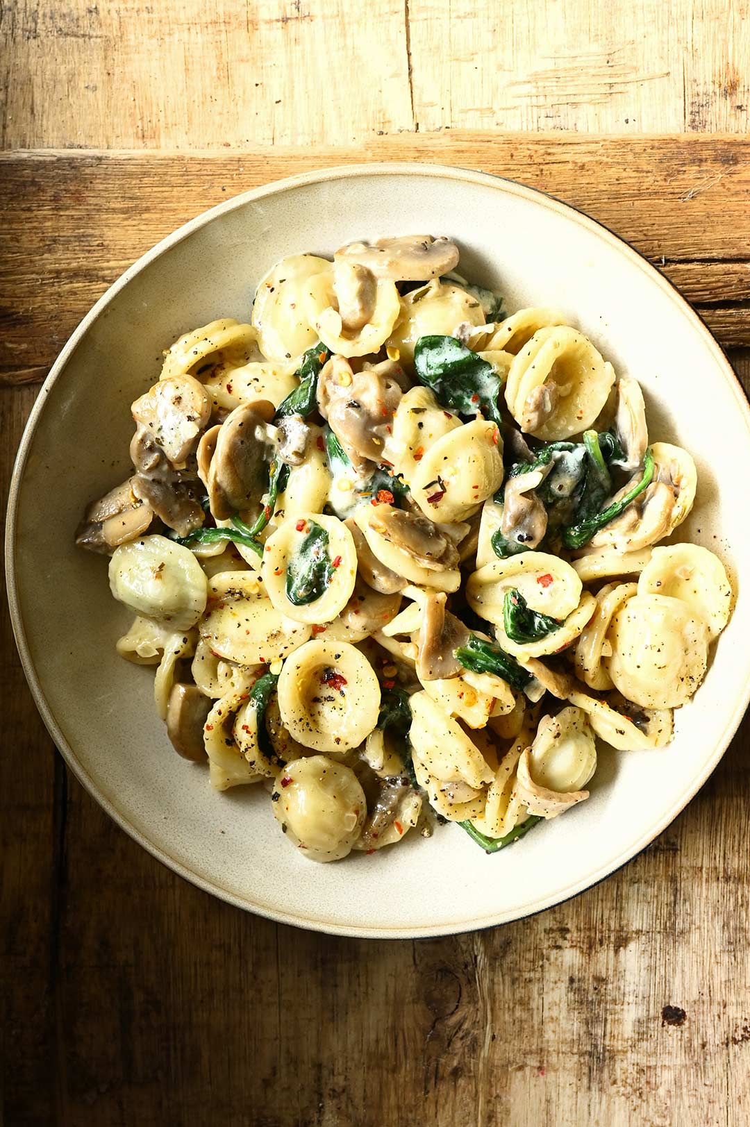 Orecchiette with mushrooms and spinach