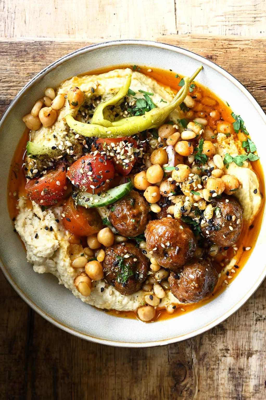 Loaded Hummus Bowl with Merguez Meatballs Serving Dumplings