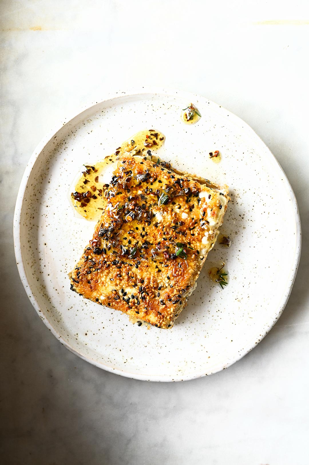 fried feta with sesame and spicy honey
