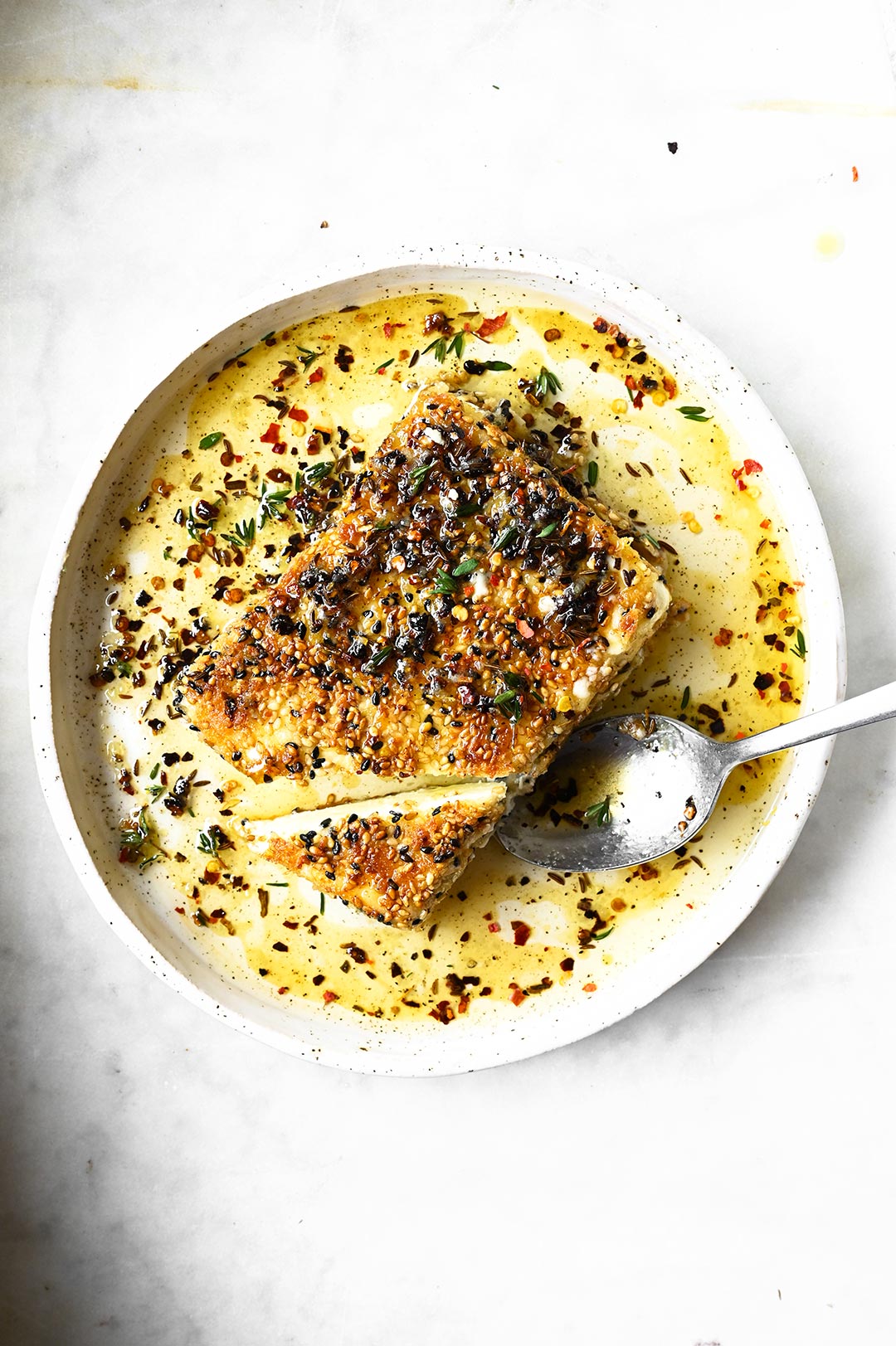 fried feta with sesame and spicy honey