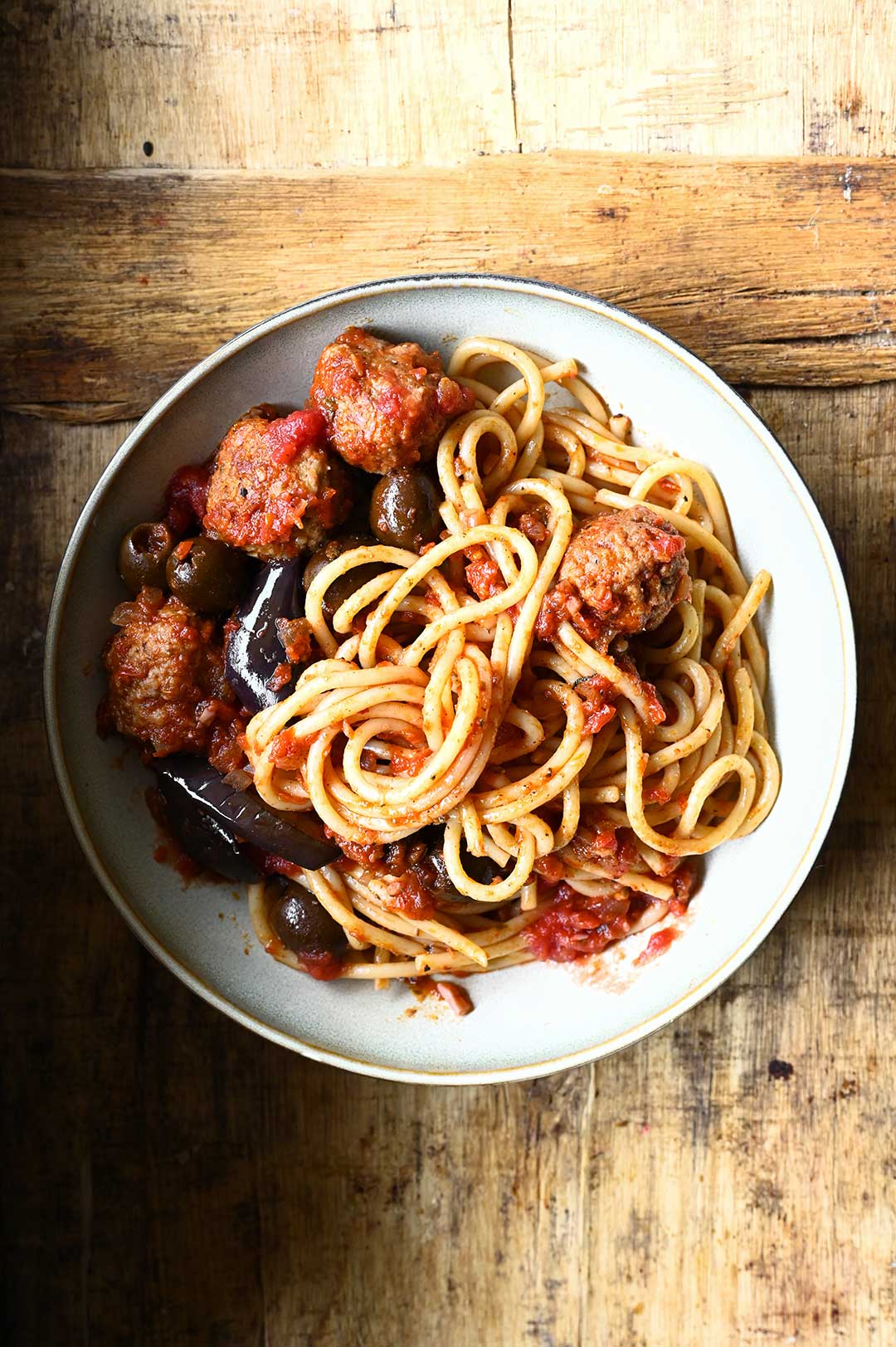 spaghetti and meatballs in tomato eggplant sauce