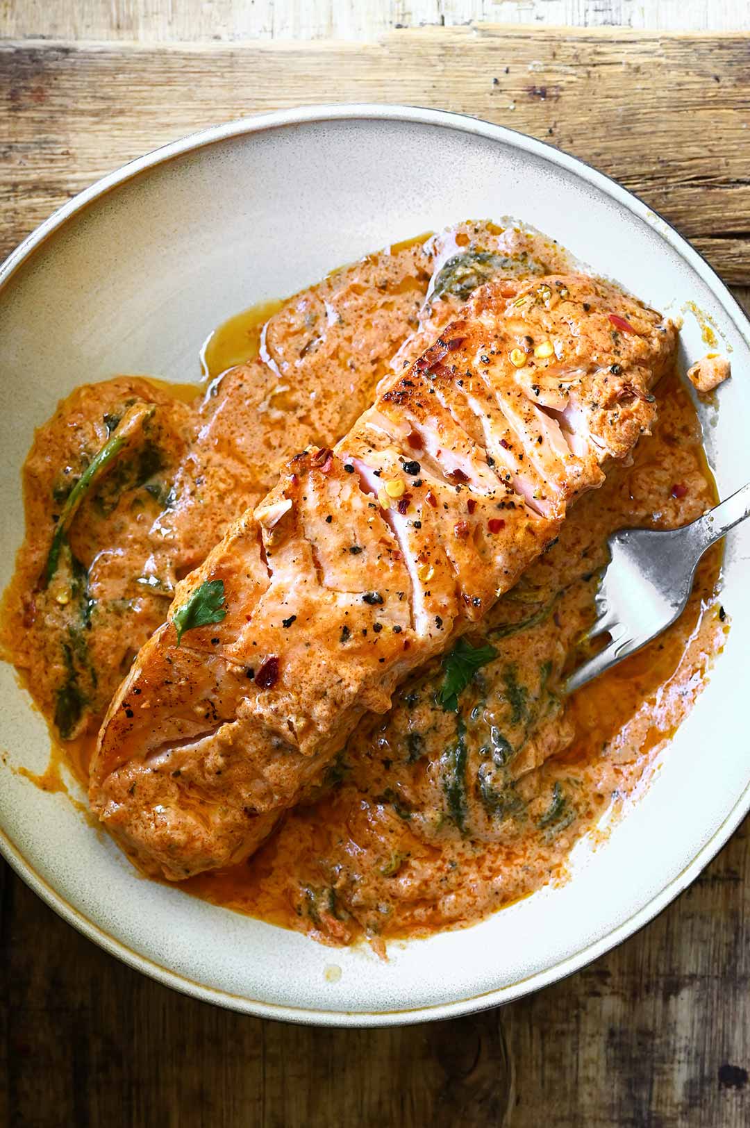 salmon in creamy red pesto sauce