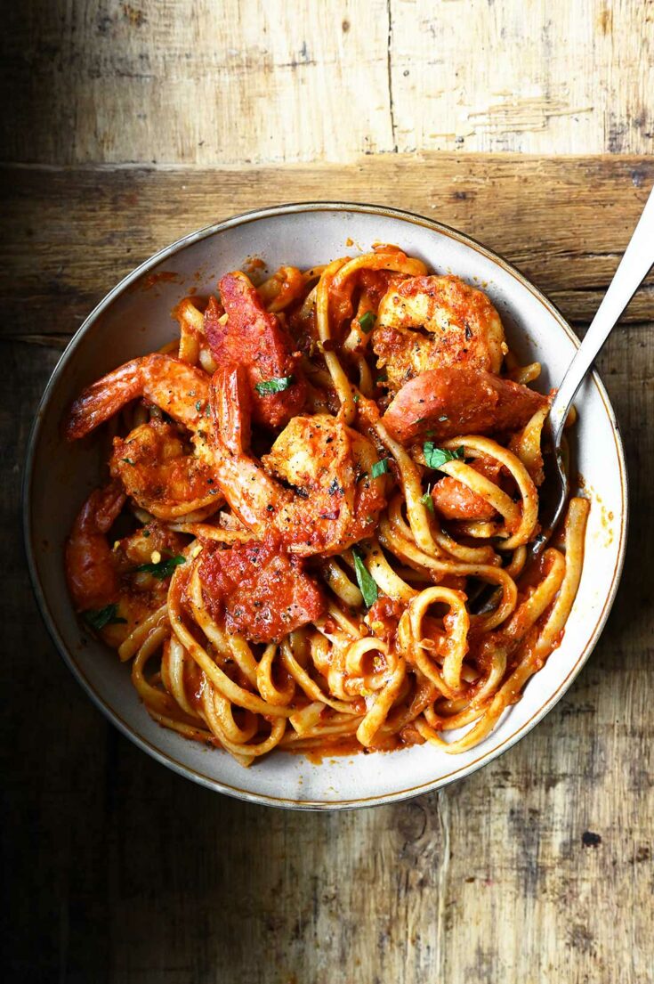 Spicy Cajun Shrimp Pasta with Sausage Serving Dumplings