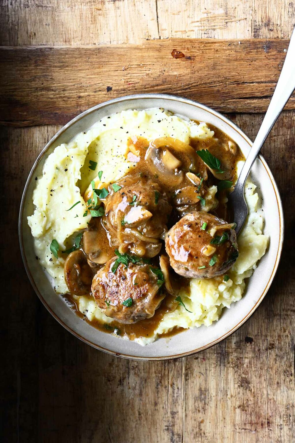 Salisbury Steak Meatballs with Mushroom Gravy Serving Dumplings