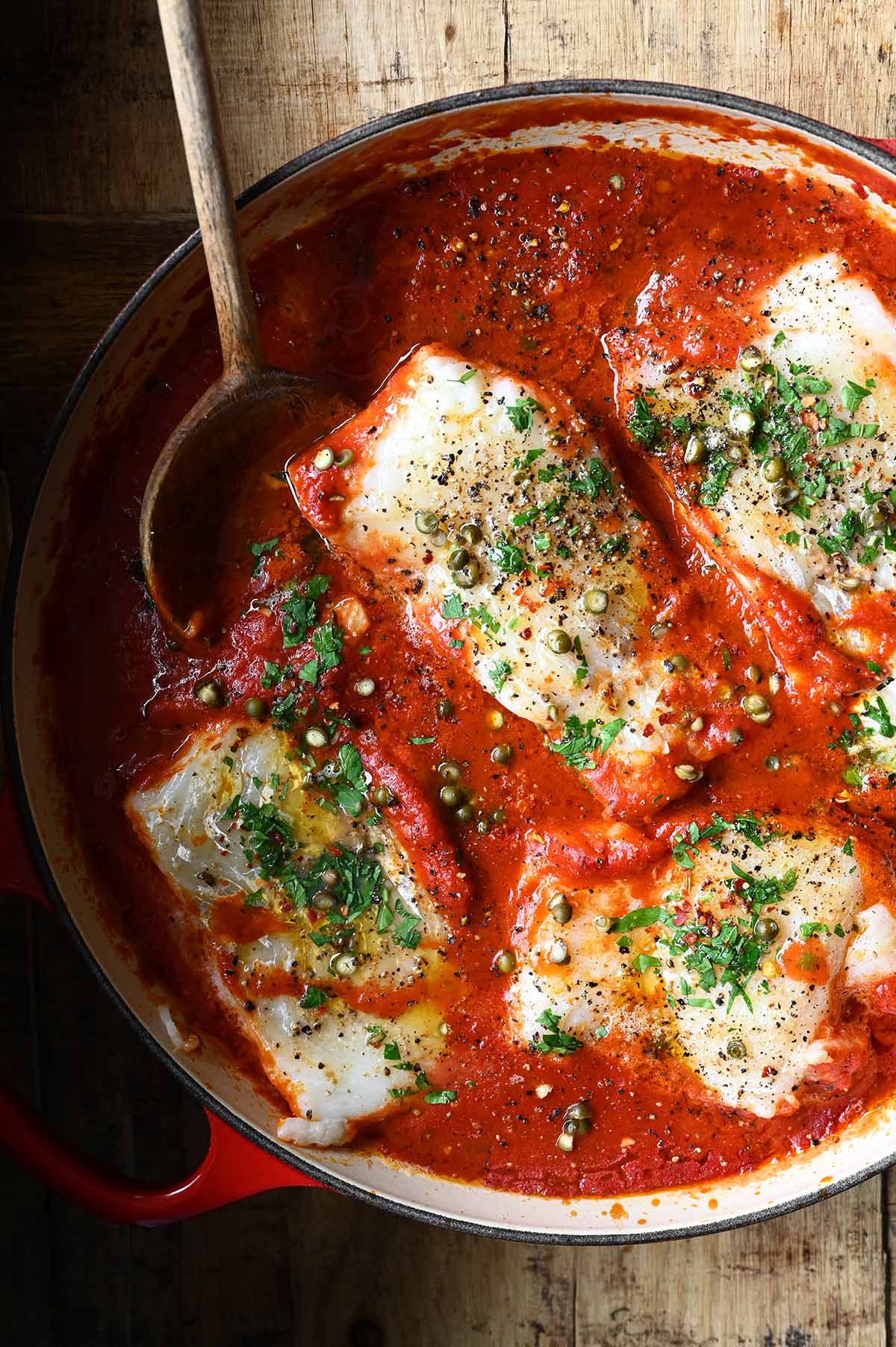 poached cod in peppery tomato sauce