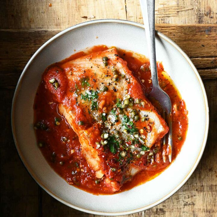 poached cod in peppery tomato sauce