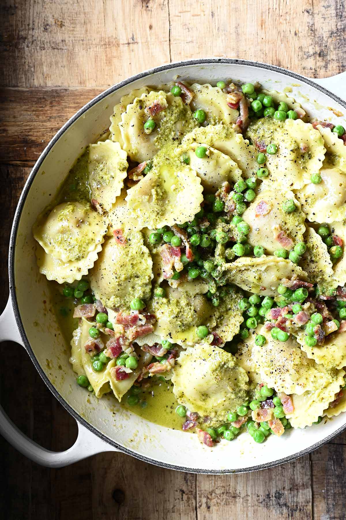 pesto ravioli with pancetta and peas