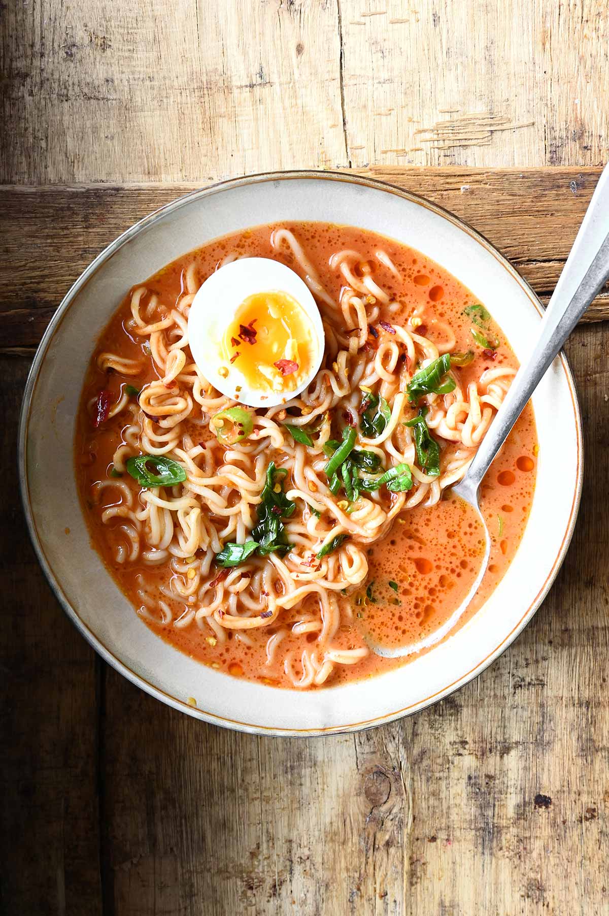 Coconut Gochujang Noodle Soup - Serving Dumplings