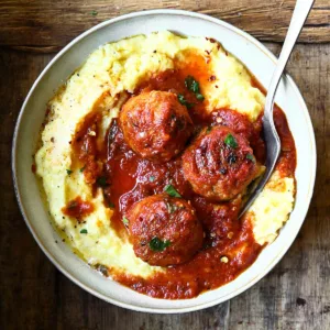 chicken meatballs all arrabbiata with polenta