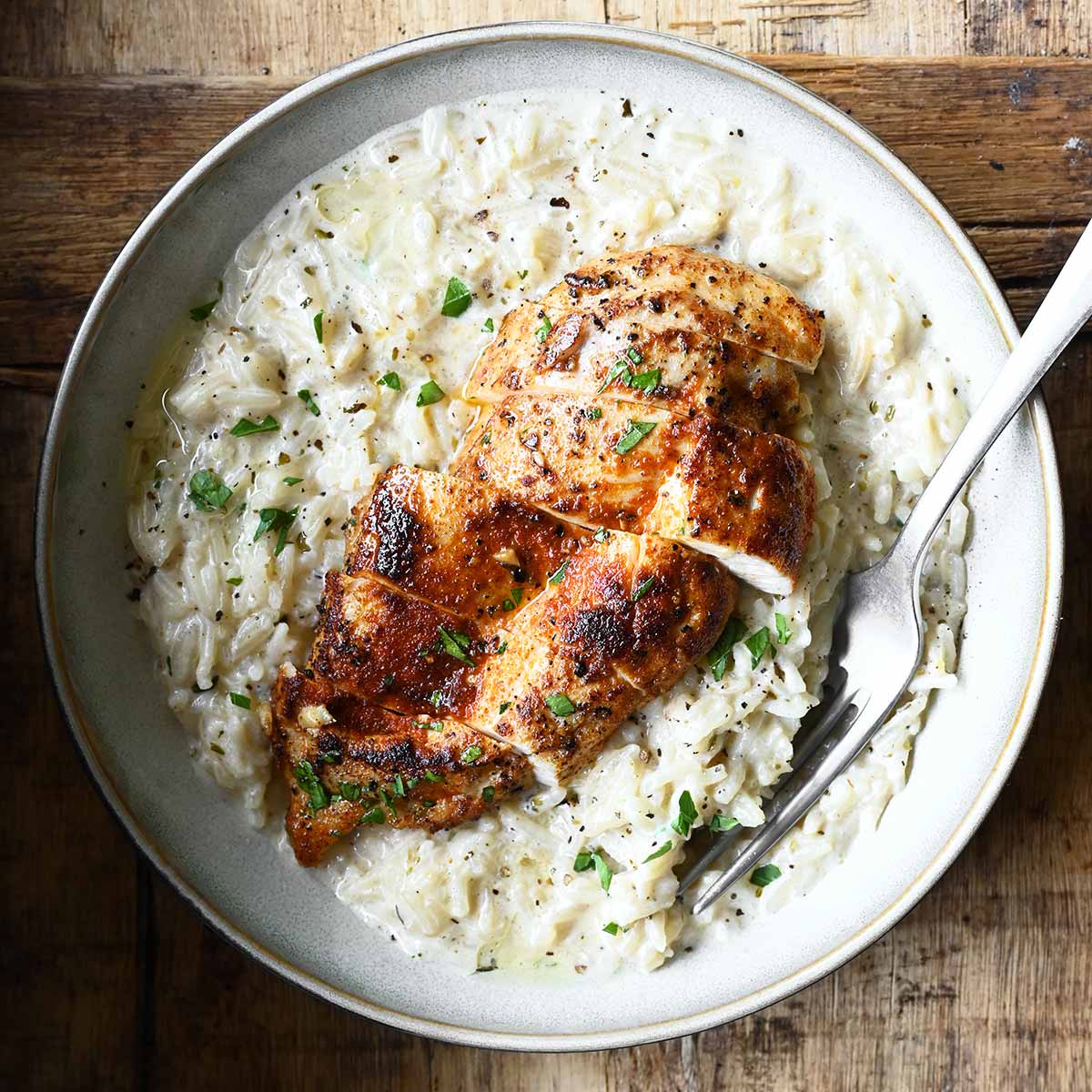 One Pot Creamy Chicken and Rice - Serving Dumplings