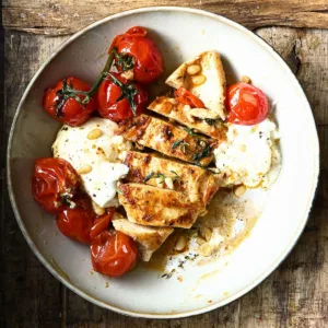 chicken with braised tomatoes and burrata
