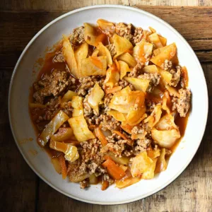 Ground Beef Cabbage Skillet - Serving Dumplings